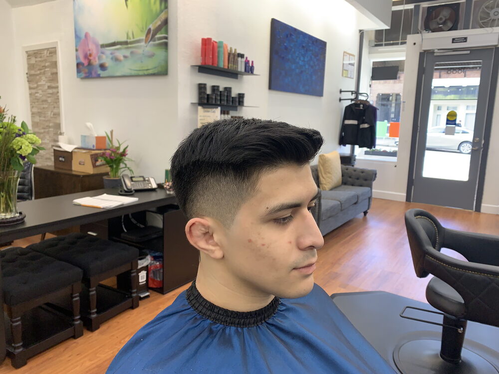 Men's side-part with skin fade