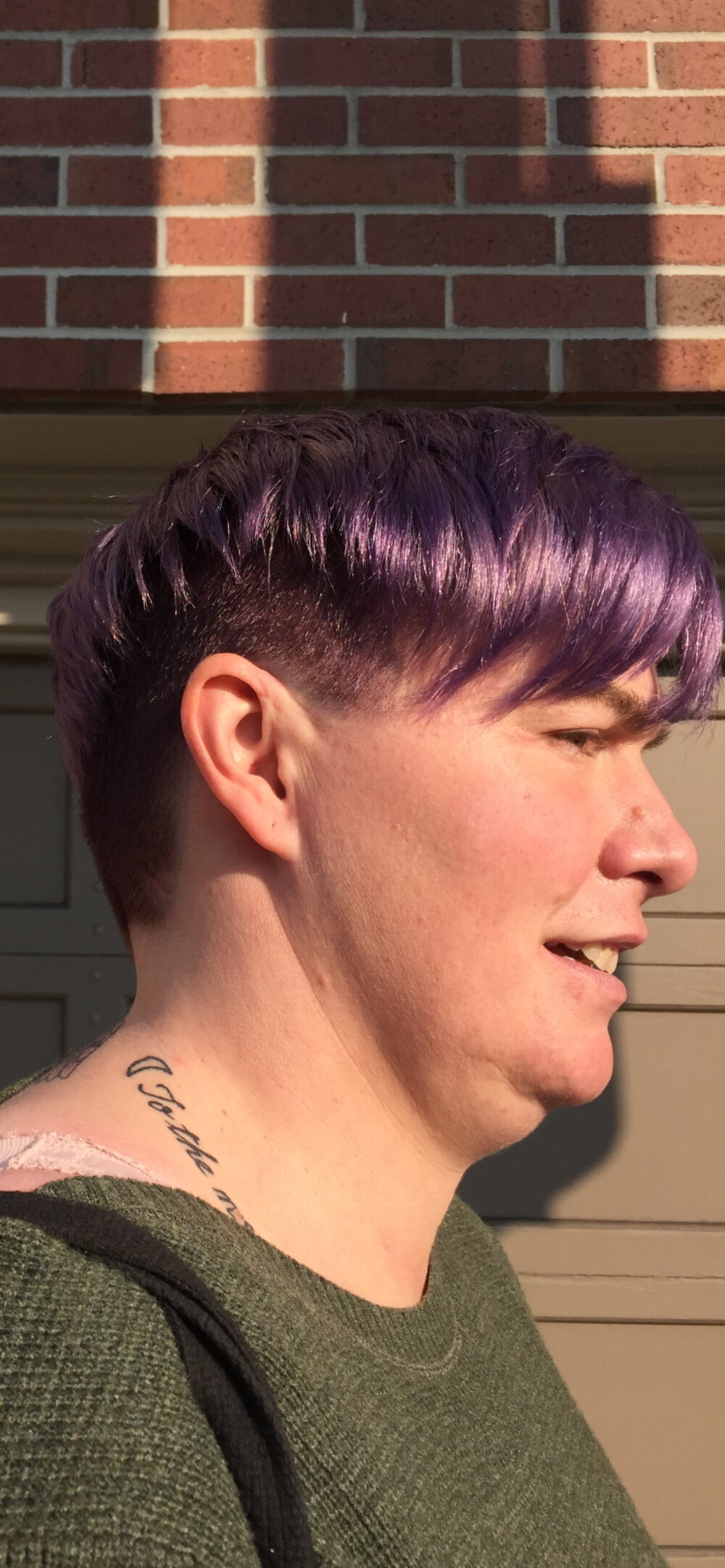 Vivid purple pixie cut with fade
